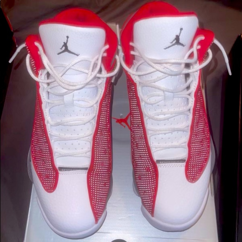 Jordan’s 13. Size 8 in men. Red and white
